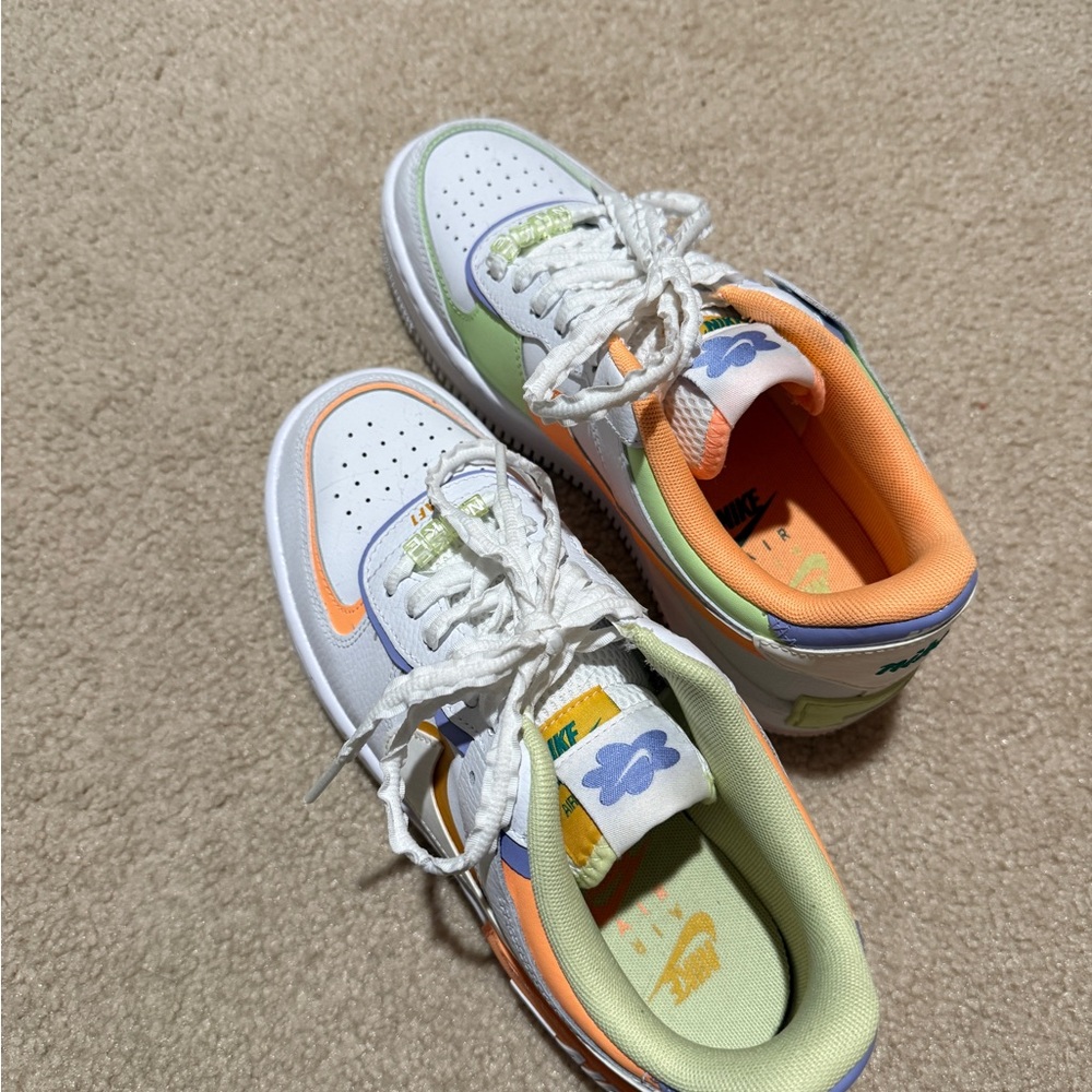 Nike White, Orange, Green, and Blue Sneakers